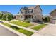 Attractive home featuring a well-maintained lawn and landscaping at 22268 E Hidden Trail Dr, Parker, CO 80138