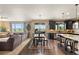 Open-concept kitchen flows into the dining and living areas, perfect for entertaining guests at 22268 E Hidden Trail Dr, Parker, CO 80138