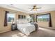 Sun-filled main bedroom with tray ceiling, plush carpet and scenic views at 22268 E Hidden Trail Dr, Parker, CO 80138