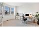 Bright and airy office space featuring a large window, desk, and ample storage for work or study at 22268 E Hidden Trail Dr, Parker, CO 80138