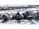 Aerial view of a house in a snow-covered neighborhood at 5808 S Duquesne Ct, Aurora, CO 80016