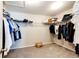 Large walk-in closet with ample shelving and hanging space at 5808 S Duquesne Ct, Aurora, CO 80016