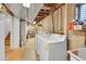 Unfinished basement with washer and dryer hookups and storage potential at 7918 S Depew St # D, Littleton, CO 80128