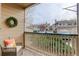 Cozy patio with seating area and view of the surrounding neighborhood at 8415 Pebble Creek Way # 102, Highlands Ranch, CO 80126