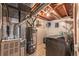 Basement mechanical area containing the home's laundry and utilities at 889 Douglas Dr, Denver, CO 80221