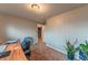 Office area with a wood-top desk and neutral-colored walls at 889 Douglas Dr, Denver, CO 80221