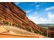 Panoramic view of Red Rocks Amphitheater; an iconic outdoor venue surrounded by stunning red rock formations at 4713 S Robb St, Littleton, CO 80127