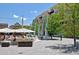 Charming town square featuring outdoor seating, planters, and sleek architectural accents in a communal space at 4713 S Robb St, Littleton, CO 80127