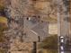 Aerial view of the house showing the roofline and driveway at 11939 W 58Th Ave, Arvada, CO 80002