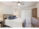 Spacious bedroom with a queen bed and plenty of closet space at 9283 E Arbor Cir # B, Englewood, CO 80111