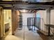 Unfinished basement featuring exposed framing, concrete floor, and utility connections at 15523 E 117Th Ave, Commerce City, CO 80022