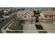 A charming two-story home with a three-car garage and well-manicured landscaping at 15523 E 117Th Ave, Commerce City, CO 80022