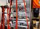 Garage area with utility sink, ladders, and boxes at 15523 E 117Th Ave, Commerce City, CO 80022