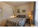 Comfortable bedroom with a window with shades and decor at 22820 E Chenango Ave, Aurora, CO 80015