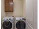 Convenient laundry room with Samsung washer and dryer at 22820 E Chenango Ave, Aurora, CO 80015