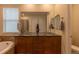 Elegant main bathroom with granite countertops, dual sinks, and a separate shower and tub at 22820 E Chenango Ave, Aurora, CO 80015