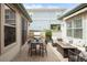 Patio featuring outdoor seating, dining, and a built in grill at 3143 Elmira St, Denver, CO 80238