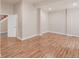 Spacious bonus room featuring hardwood floors at 3143 Elmira St, Denver, CO 80238