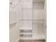 Walk-in closet featuring built-in shelving and ample storage space at 3143 Elmira St, Denver, CO 80238