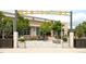 Eastbridge town center featuring shopping and dining areas with manicured landscaping and open spaces at 3143 Elmira St, Denver, CO 80238