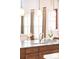 Kitchen island featuring granite countertop, a stainless sink and pendant lighting at 3143 Elmira St, Denver, CO 80238