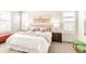 A cozy main bedroom with neutral tones and plush bedding at 3143 Elmira St, Denver, CO 80238