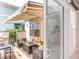 Outdoor patio seating area with comfortable seating and shade at 3143 Elmira St, Denver, CO 80238