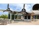Unique restaurant building designed with airplane wing features and outdoor patio seating at 3143 Elmira St, Denver, CO 80238