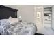 Clean, bright bedroom with a large window and adjacent bathroom offering a relaxing atmosphere at 1625 Larimer St # 1104, Denver, CO 80202