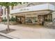 Elegant building entrance with stone accents, recessed lighting, and a welcoming glass entryway for pedestrian access at 1625 Larimer St # 1104, Denver, CO 80202