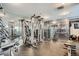 Well-equipped gym with modern machines, weights, mirrors, and motivational decor at 1625 Larimer St # 1104, Denver, CO 80202
