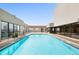 Indoor pool surrounded by windows, offering a bright and airy space for swimming and recreation at 1625 Larimer St # 1104, Denver, CO 80202