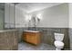 Modern bathroom with walk-in shower and updated vanity at 3872 S Dallas St # 7-101, Aurora, CO 80014