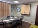 Modern conference room with a large table and comfortable seating at 3872 S Dallas St # 7-101, Aurora, CO 80014