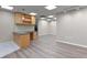 Modern office space with wood cabinets and desk at 3872 S Dallas St # 7-101, Aurora, CO 80014