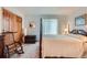 Bedroom with carpeting, bright natural light, closet, and dresser at 31190 Cinnamonwood, Evergreen, CO 80439
