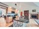 Stylish kitchen featuring a large island, granite countertops, stainless steel appliances, and ample cabinet space at 31190 Cinnamonwood, Evergreen, CO 80439