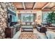 Relaxing living room showcasing natural light, comfortable seating, and stylish decor at 31190 Cinnamonwood, Evergreen, CO 80439