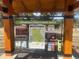 Elk Meadow Park information kiosk with trail maps and regulations for responsible enjoyment of the area at 31190 Cinnamonwood, Evergreen, CO 80439
