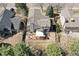 Aerial view of a home showing the backyard deck, pergola, patio, and surrounding landscape at 270 S Locust St, Denver, CO 80224