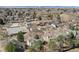 Neighborhood aerial shot showcasing the property's location with views of Denver skyline and surrounding homes at 270 S Locust St, Denver, CO 80224