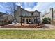 Enjoy the large backyard with a spacious deck, pergola, lounge area, and built-in fire pit at 270 S Locust St, Denver, CO 80224