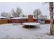 Backyard featuring a trampoline surrounded by a privacy fence at 460 Lansing St, Aurora, CO 80010