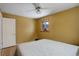 Bright bedroom with white ceiling fan and window at 460 Lansing St, Aurora, CO 80010