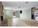 Bright living room with sliding glass door and stone fireplace at 460 Lansing St, Aurora, CO 80010