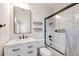 Contemporary bathroom showcasing a white vanity, updated fixtures, and walk-in shower at 493 Pine Flower Ct, Highlands Ranch, CO 80126