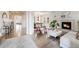 Spacious open-concept living room featuring a fireplace and hardwood floors at 493 Pine Flower Ct, Highlands Ranch, CO 80126