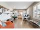 Bright office space featuring natural light, modern furnishings, and decorative shelving at 493 Pine Flower Ct, Highlands Ranch, CO 80126