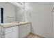 Well-lit bathroom featuring a vanity with a sink, and a mirror at 14333 E 1St Dr # 307, Aurora, CO 80011