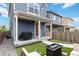 Relaxing backyard features a built-in barbeque at 12740 Tamarac St, Thornton, CO 80602